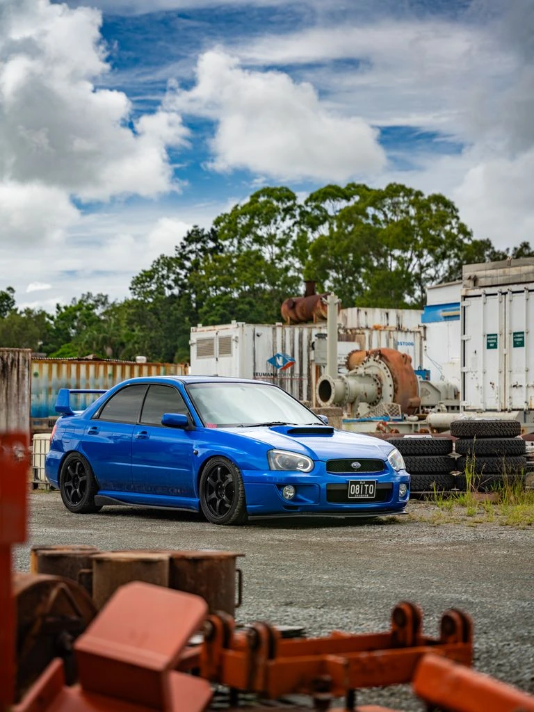 A 2006 Subaru WRX STI with a built EJ257 engine on display.