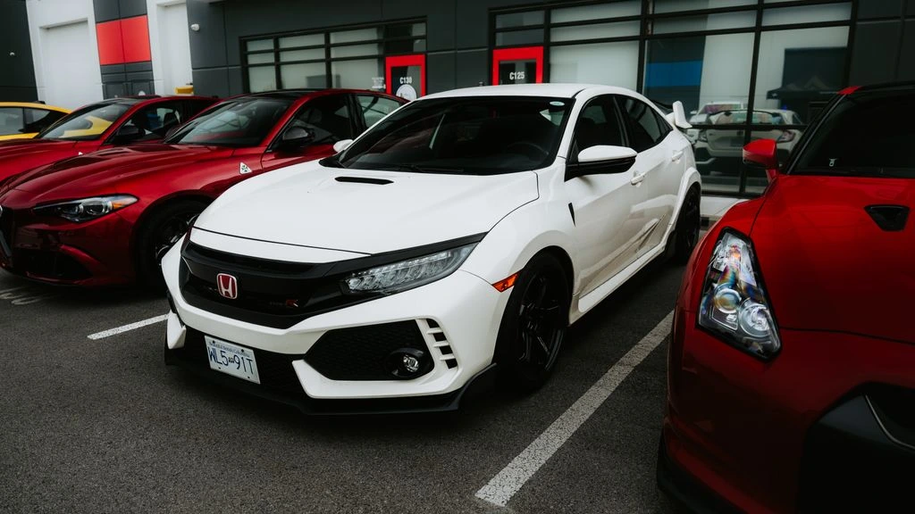 A 2017 Honda Civic Type R receiving a Hondata calibration and exhaust.